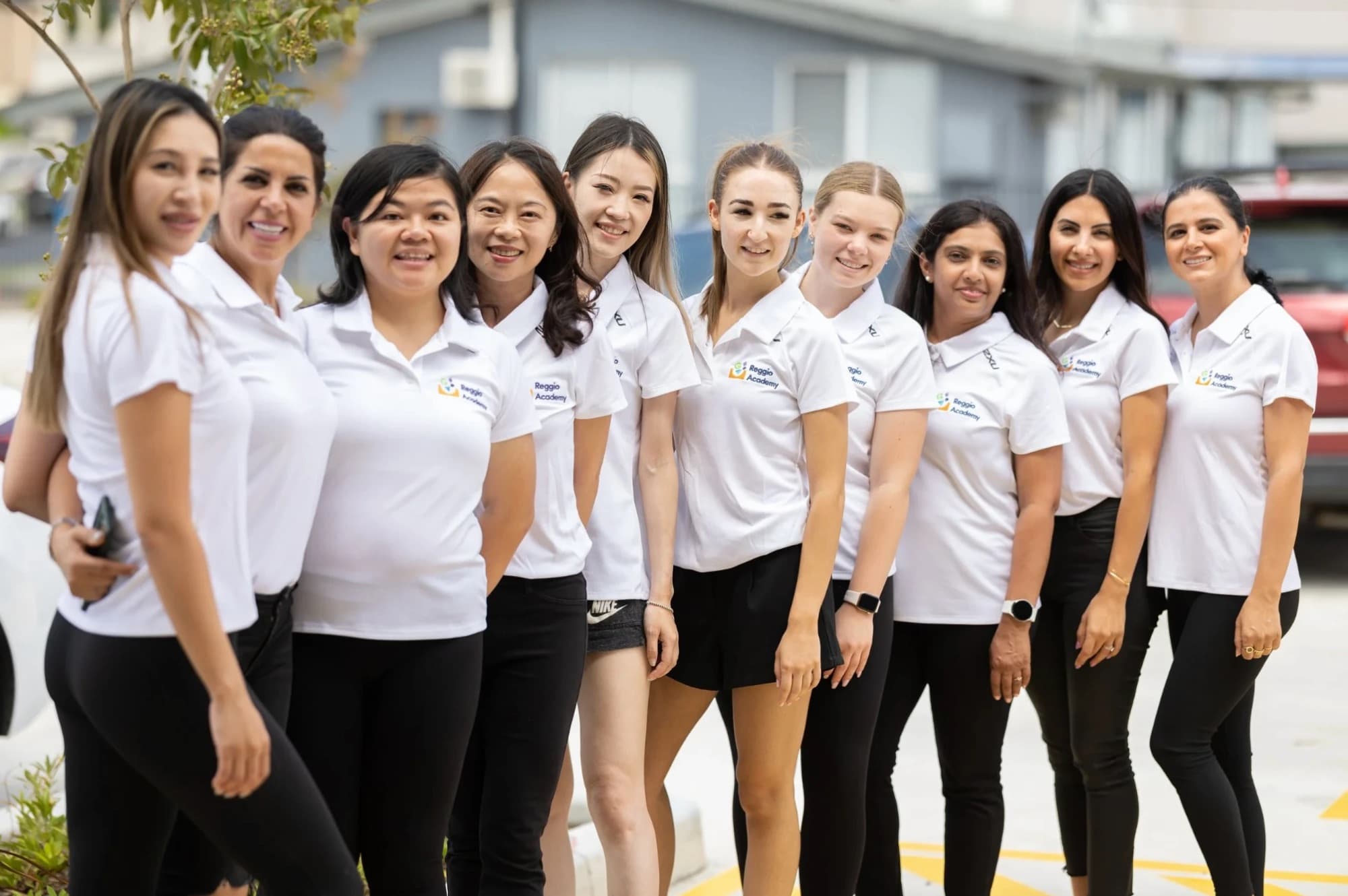 Members of the Reggio Academy Castle Hill team in their white polo shirts