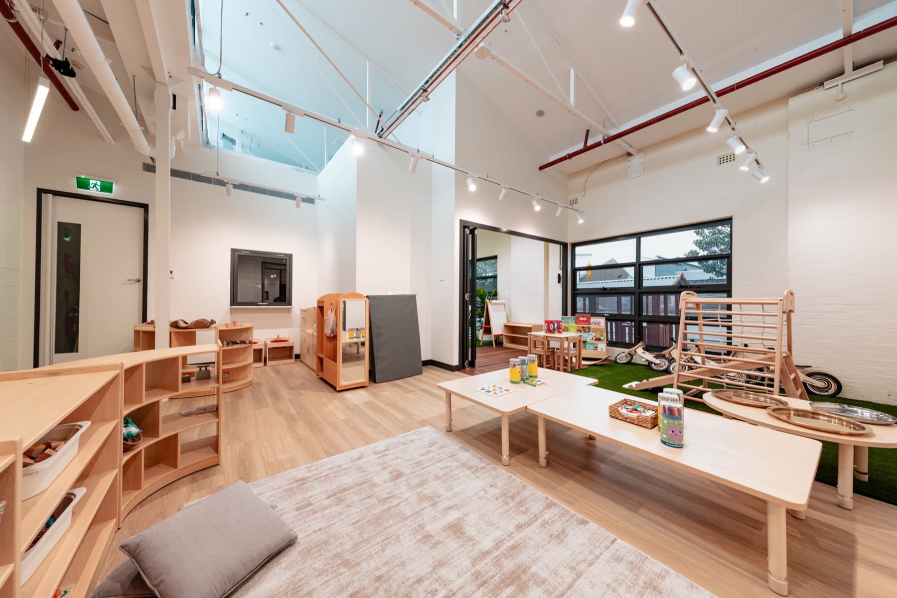 A calm room at Rosebery with low timber shelves